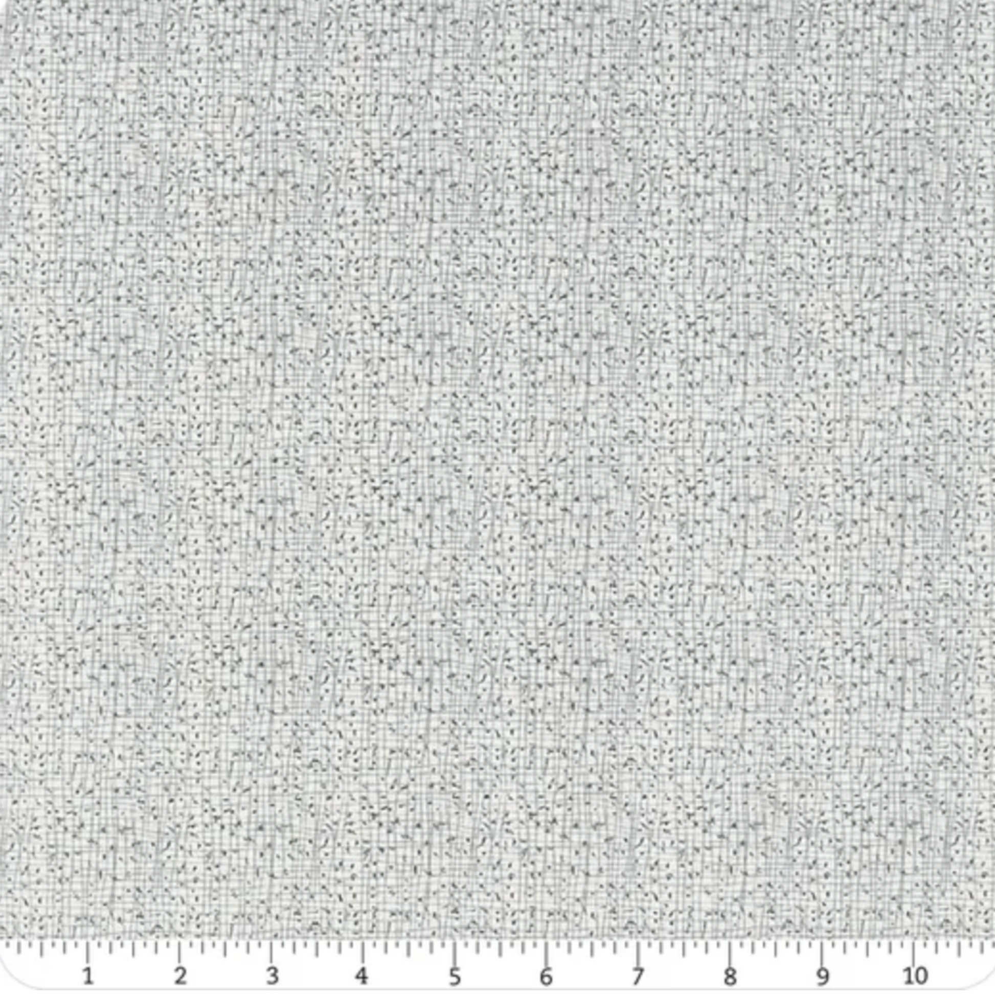 Textured gray fabric pattern with a ruler at the bottom for scale.