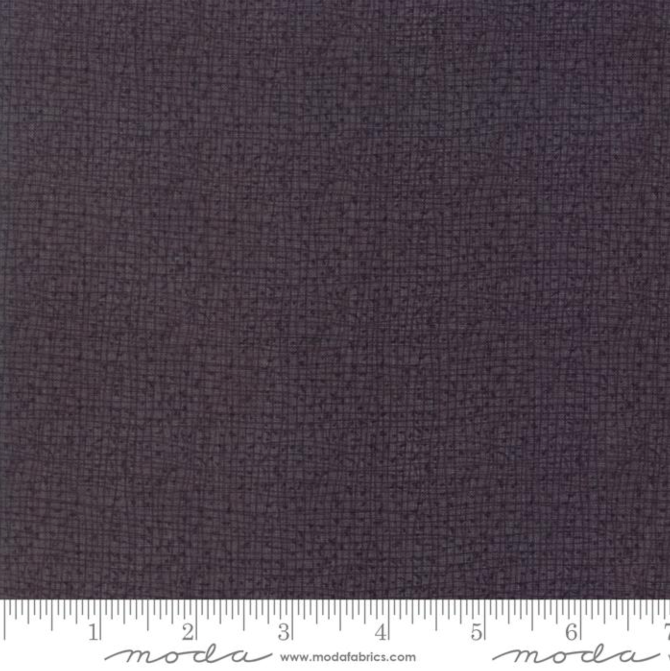Dark purple fabric swatch with a ruler at the bottom
