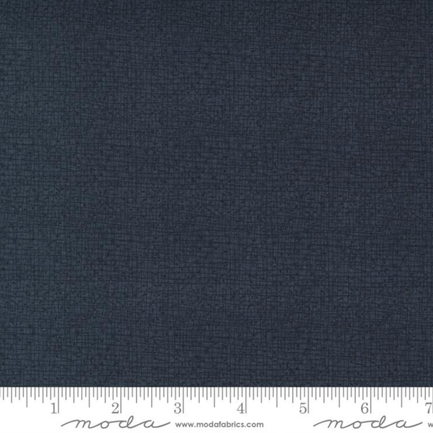 Soft black fabric swatch with a ruler at the bottom