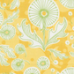 Fabric with green floral pattern on a yellow background.