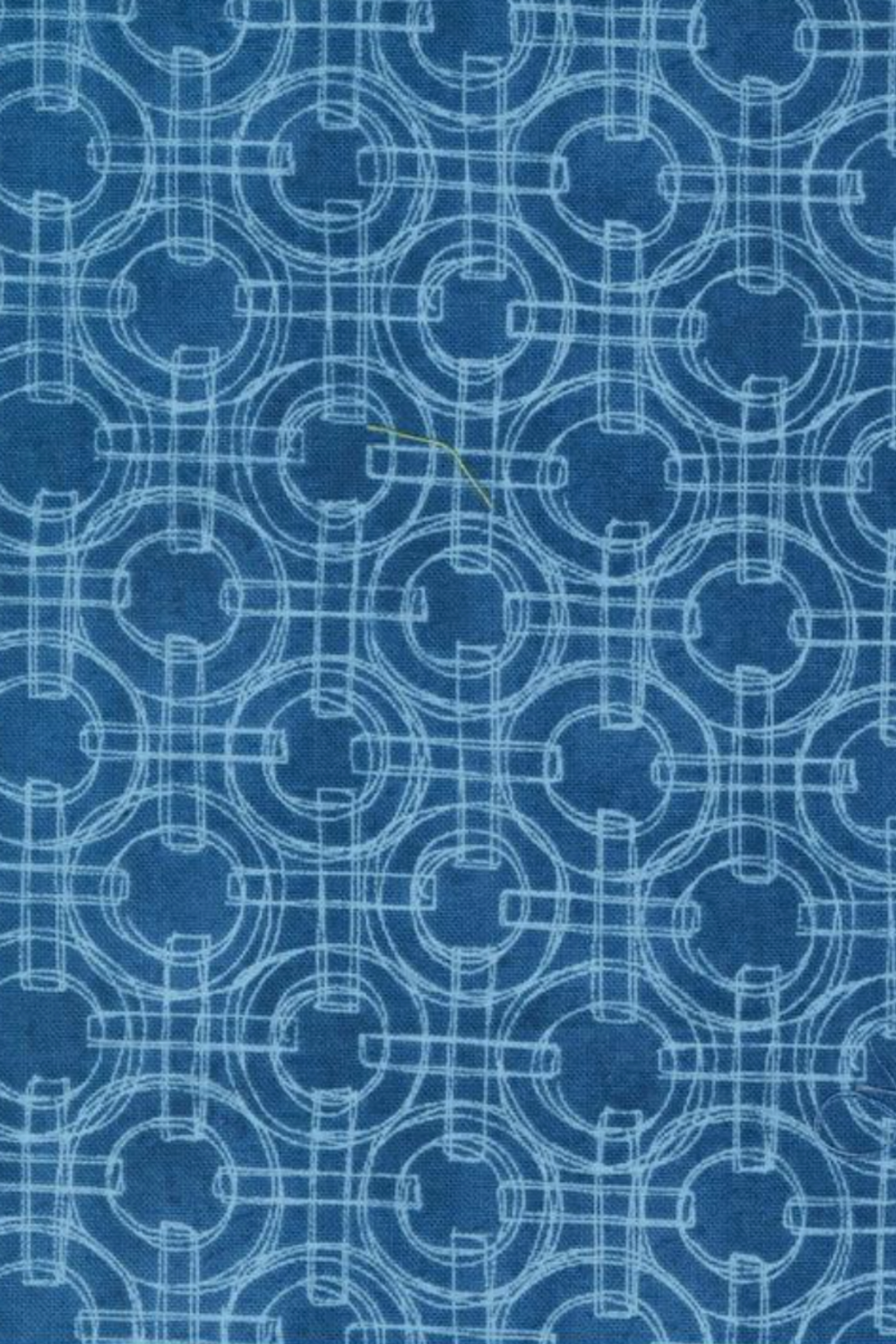 Serena Shores Coastal fabric by Robin Pickens for Moda Fabrics, featuring pale blue sketched linked rings and intersecting lines on a deep blue ground.
