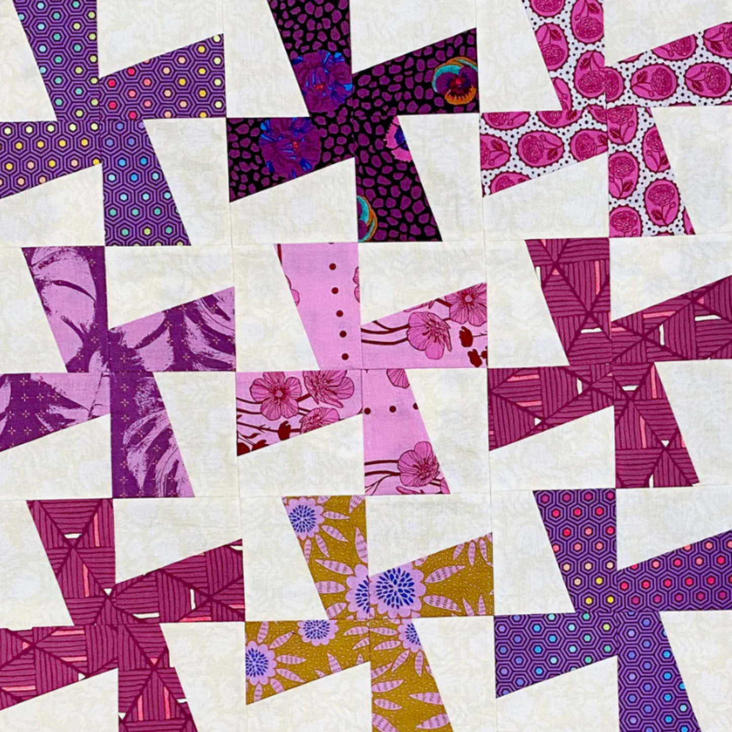 Modern quilt made with Quick Straight ruler – pink and purple angled patchwork design