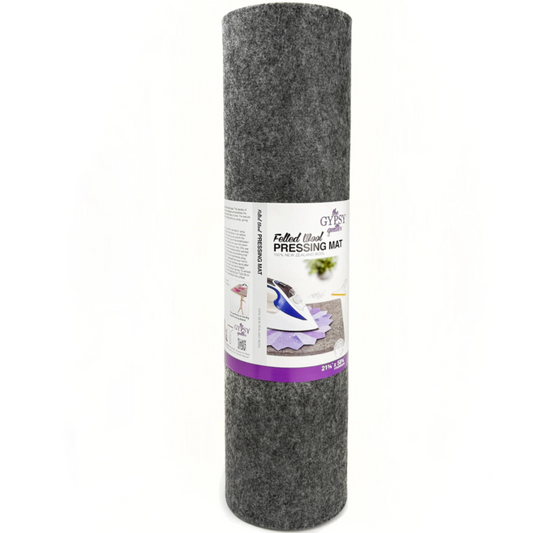 Rolled gray Gypsy Quilter felted wool pressing mat with product label packaging