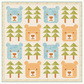 Baby Bear quilt pattern displayed as a woodland nursery wall hanging above a crib in a cozy baby room
