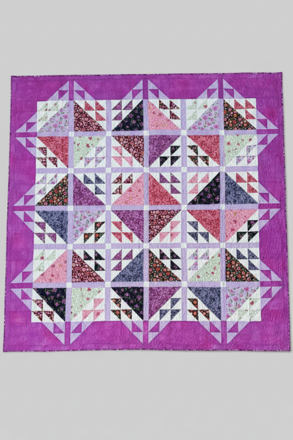 Handmade Emilia quilt in floral and geometric design, large size 76 by 76 inches.