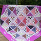 Handmade Emilia quilt in floral and geometric design, large size 76 by 76 inches.