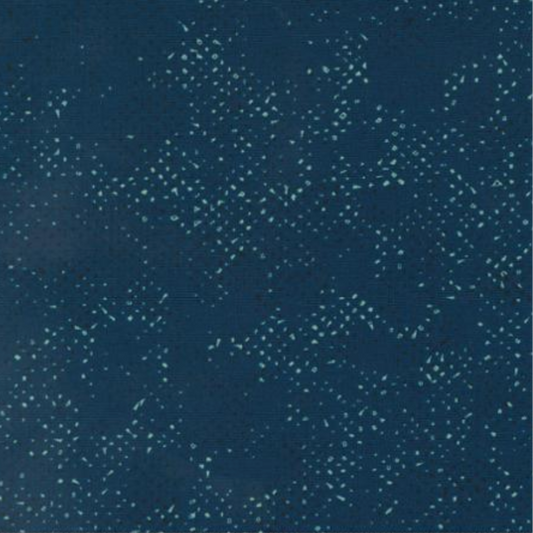 Spotted Mood Dark Blue fabric by Zen Chic for Moda Fabrics — deep teal-navy ground with scattered light dot texture, 100% cotton quilting blender. Available at IraRobi Quilts.