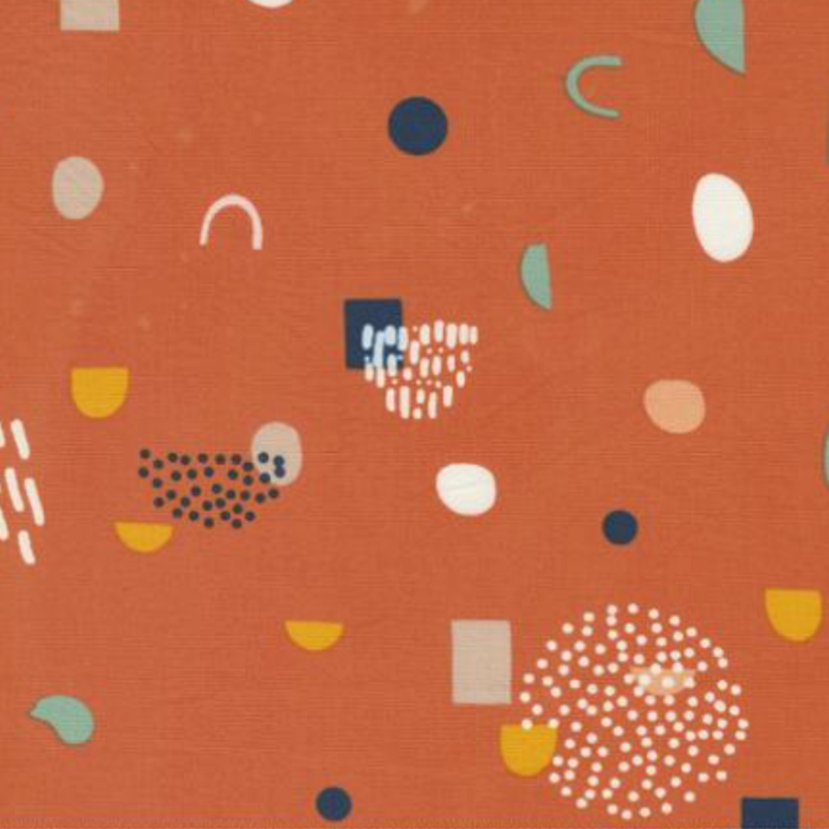 Close-up of Frisky Catch Me Cheeky fabric by Zen Chic for Moda Fabrics showing navy, mint, mustard, cream, and blush abstract shapes on a rust-orange ground