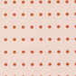 lose-up of Frisky In A Row Sweetie fabric by Zen Chic for Moda Fabrics showing rust-orange dots in neat rows on blush pink