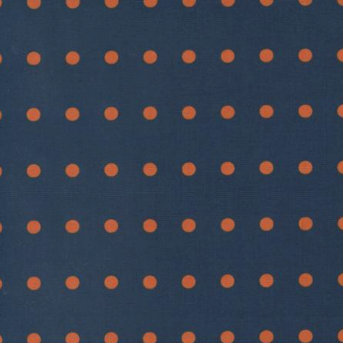 Close-up of Frisky In A Row Moody fabric by Zen Chic for Moda Fabrics showing rust-orange dots in neat rows on deep navy