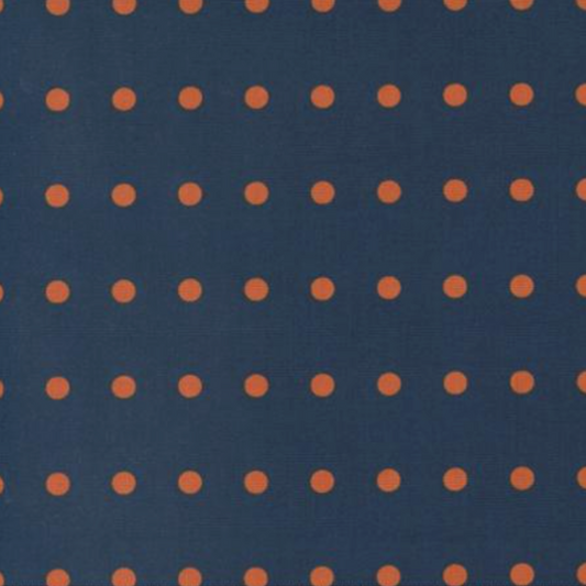Close-up of Frisky In A Row Moody fabric by Zen Chic for Moda Fabrics showing rust-orange dots in neat rows on deep navy