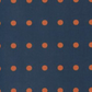 Close-up of Frisky In A Row Moody fabric by Zen Chic for Moda Fabrics – evenly spaced rust-orange dots in neat rows on a deep navy cotton ground. Available at IraRobi Quilts.