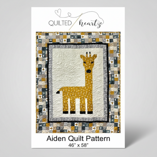 Quilt pattern packaging for 'Aiden' quilt with a giraffe design on a white background.