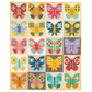 Quilt with colorful butterfly patterns on a beige background