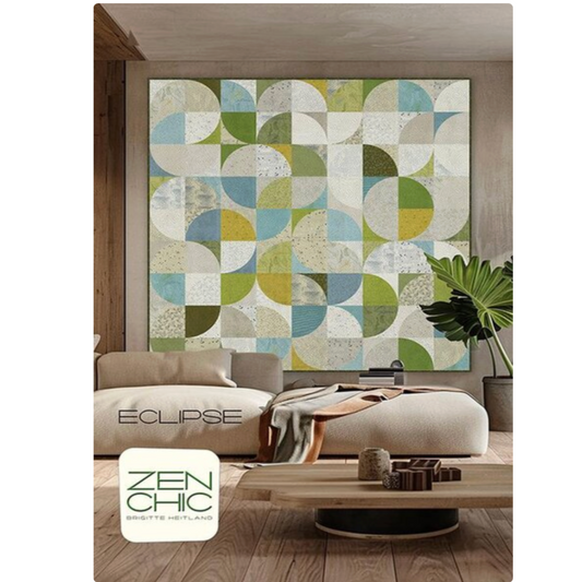 Living room with a large abstract wall art piece and 'Eclipse' furniture.