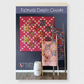 Robin Pickens quilt pattern book titled 'Fiona's Daisy Chain' with displayed quilts.