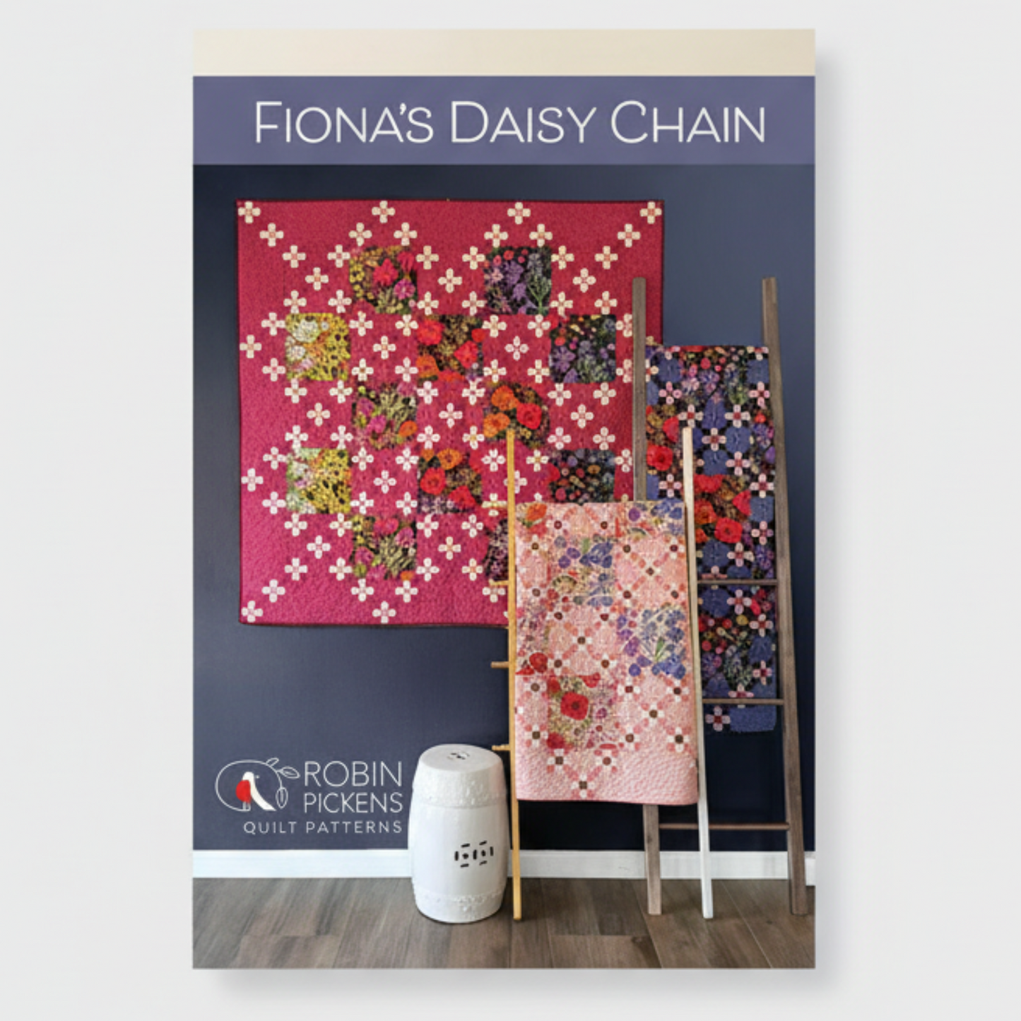 Robin Pickens quilt pattern book titled 'Fiona's Daisy Chain' with displayed quilts.