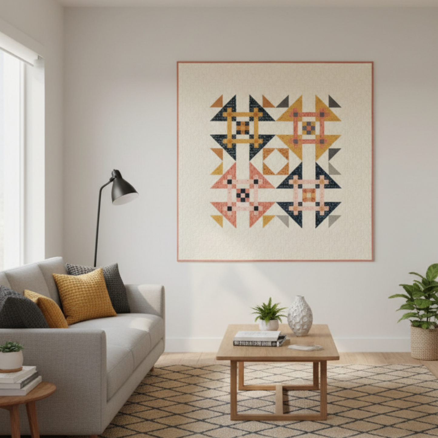 Living room with a geometric-patterned wall art piece, gray sofa, wooden coffee table, and plants.
