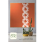 Poster with geometric design on an orange background, featuring the brand 'Zen Chic'.