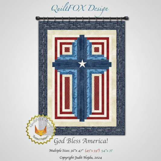 Quilt with blue cross design on a white background, featuring 'God Bless America!' text.