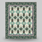 Quilt with geometric pattern on a gray background