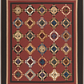 Quilt with geometric diamond pattern on a red background