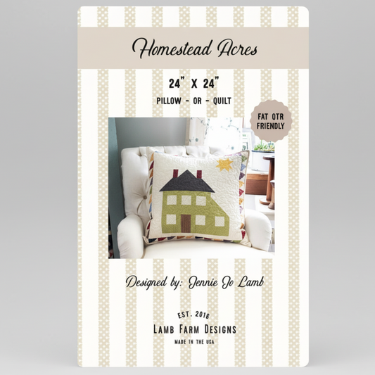 Product packaging for 'Homestead Acres' pillow or quilt design by Jennie Jo Lamb, featuring a house-themed pillow.