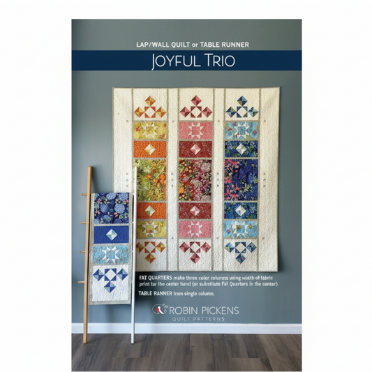 Quilt pattern book titled 'Joyful Trio' by Robin Pickens with colorful quilt design on a gray background.