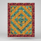 Fabric Cafe Kaleidoscope quilt pattern with geometric design on a white background