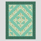 Quilt with geometric pattern on a green background