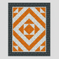 Quilt pattern with orange and white geometric design on a gray background