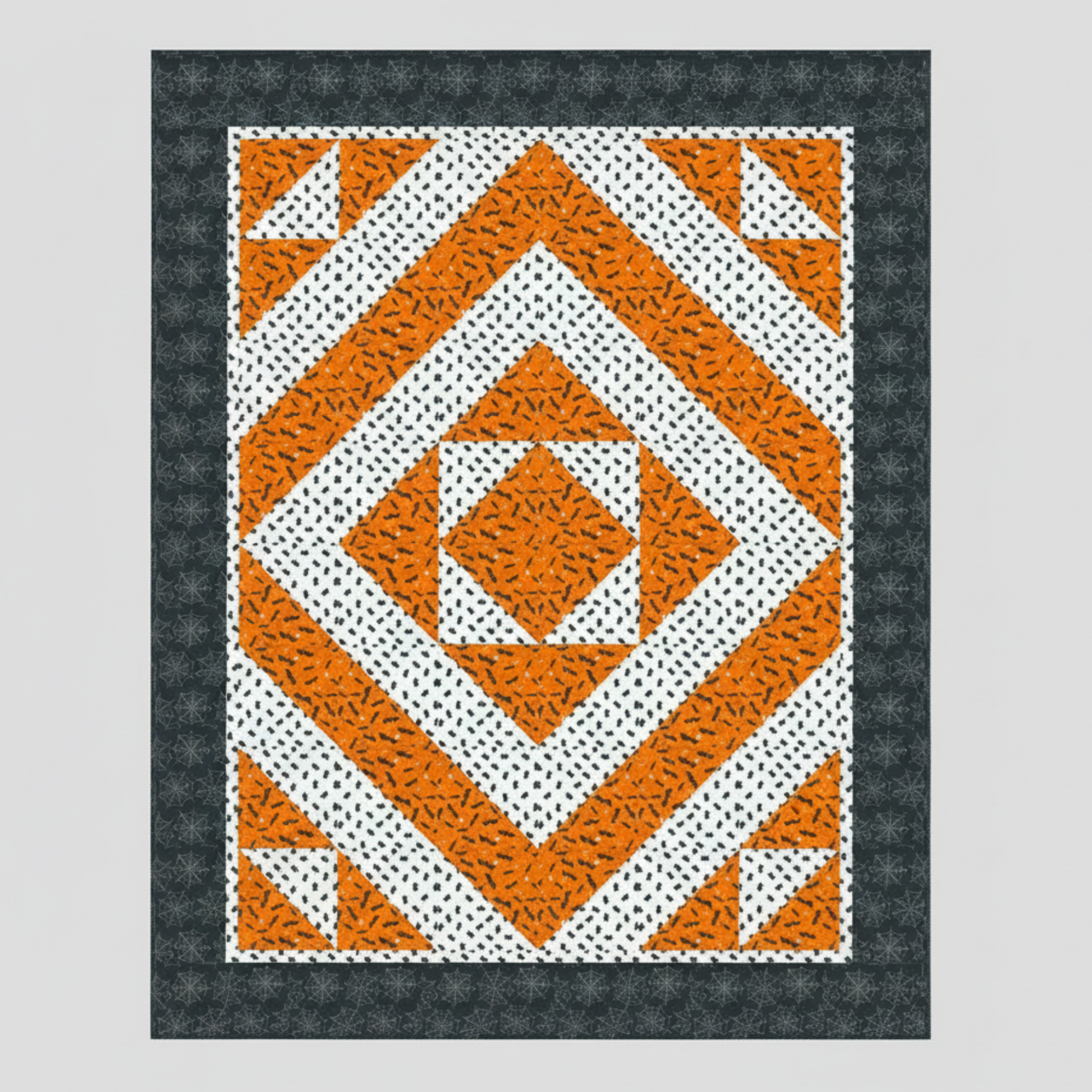 Quilt pattern with orange and white geometric design on a gray background