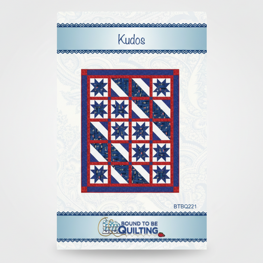 Quilt pattern packaging with blue and red star design on a white background