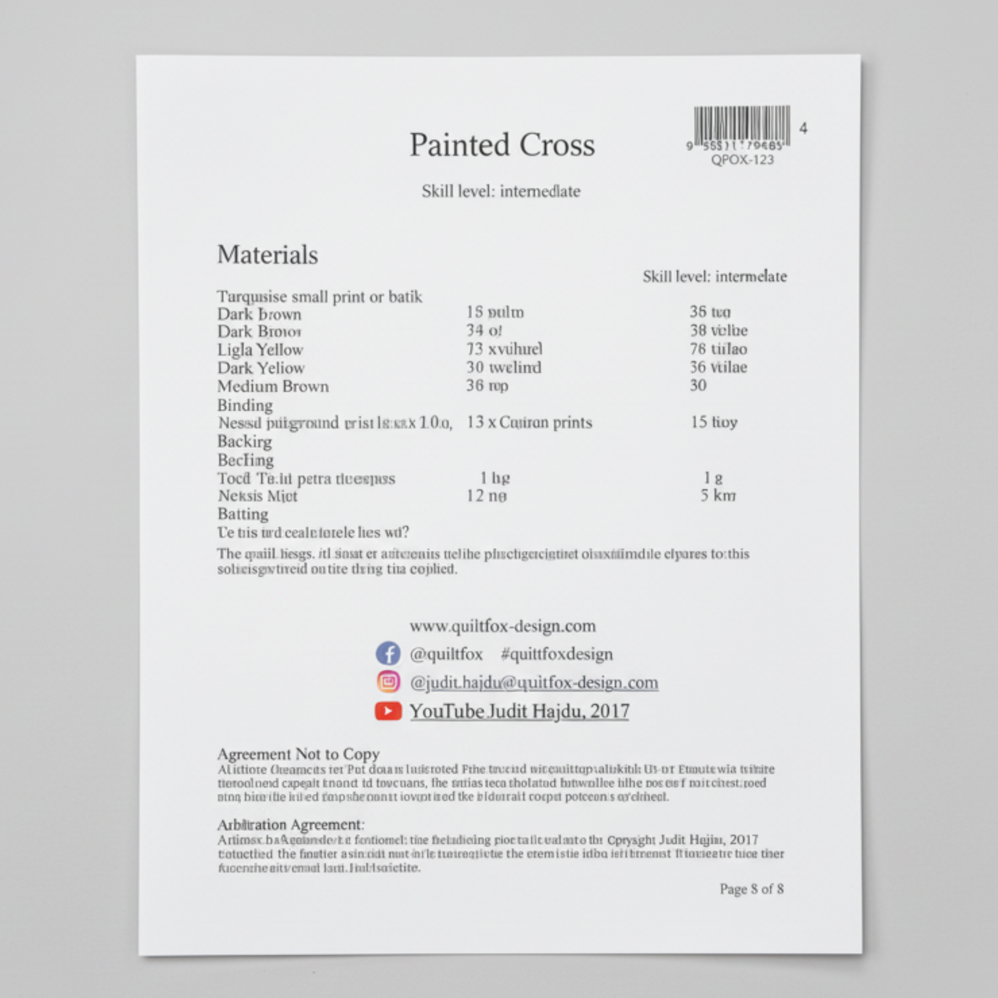 Back of a quilt pattern packaging with text and a barcode.