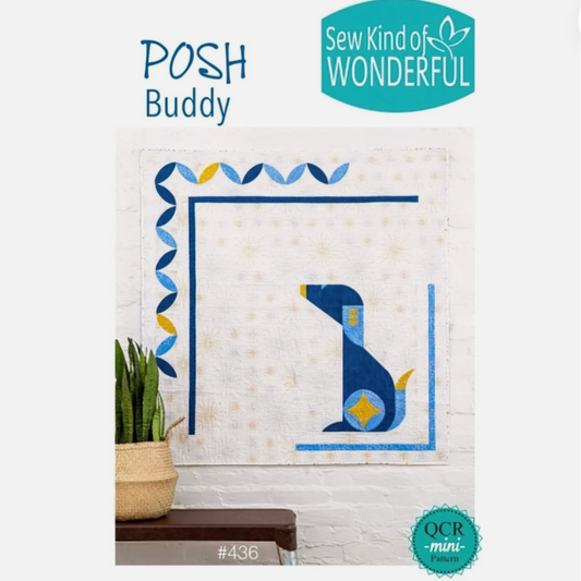 Quilt with blue and yellow design on a white background, featuring 'Posh Buddy' and 'Sew Kind of Wonderful' branding.