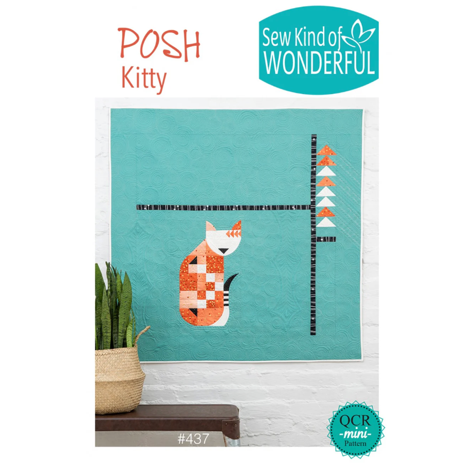 Quilt with a cat design on a teal background, featuring 'Posh Kitty' and 'Sew Kind of Wonderful' logos.