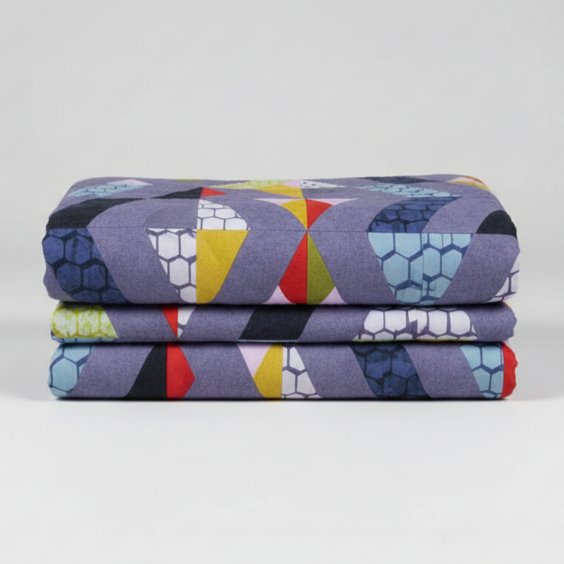 Living room with a blue sofa and abstract wall art, featuring 'Zen Chic' brand.