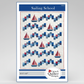 Quilt pattern packaging for 'Sailing School' by Canuck Quilter Designs with sailboat design.