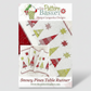 Pattern book cover for 'Snowy Pines Table Runner' by The Pattern Basket with quilt images and branding.
