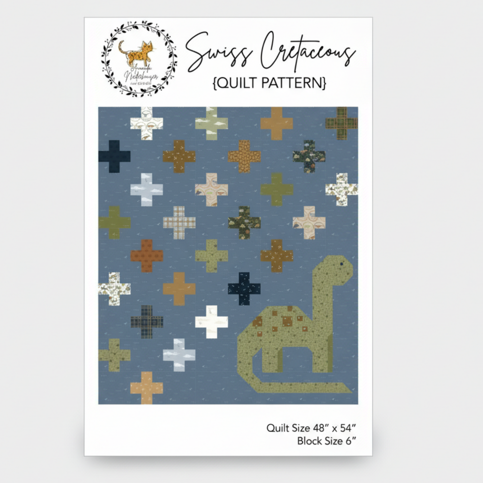 Quilt pattern with dinosaur design on a blue background, featuring the brand 'Swiss Cretaceous'.