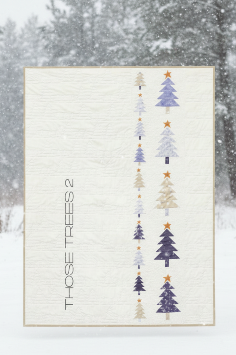 Framed artwork with vertical Christmas tree illustrations and 'Those Trees 2' text against a snowy forest background.