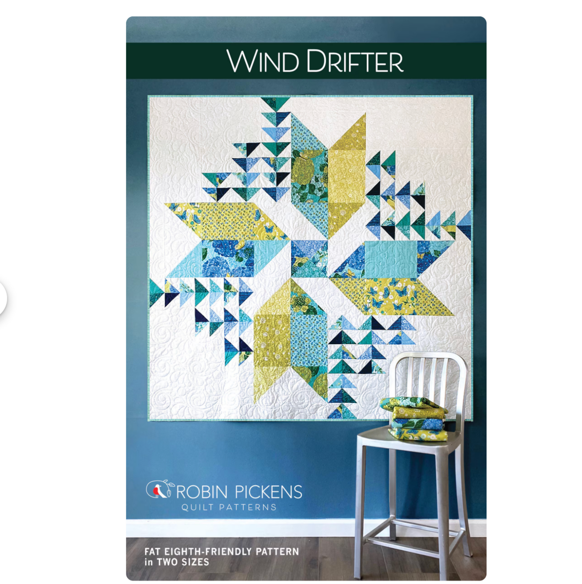 Robin Pickens quilt pattern packaging for 'Wind Drifter' with a chair and pillow displaying the design.