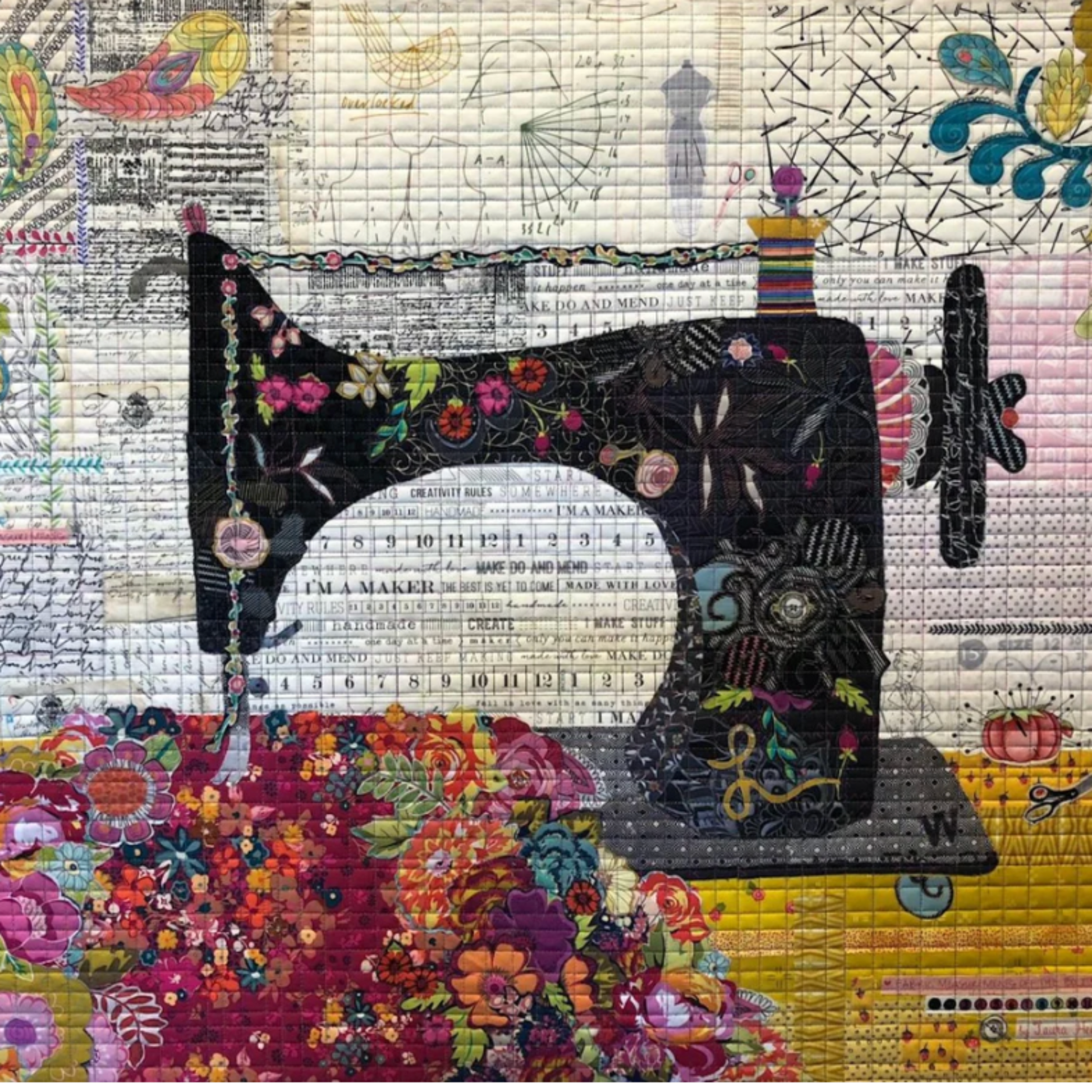 Finished fabric collage wall art created using Laura Heine’s collage quilting technique