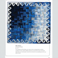 Blue and white quilt with geometric pattern on a white background