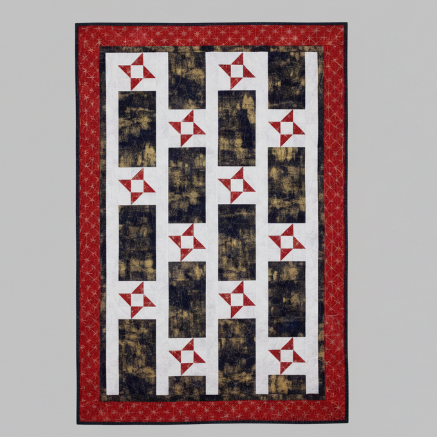 Patriotic lap quilt pattern with red white and blue star blocks from Make It Patriotic with 3-Yard Quilts