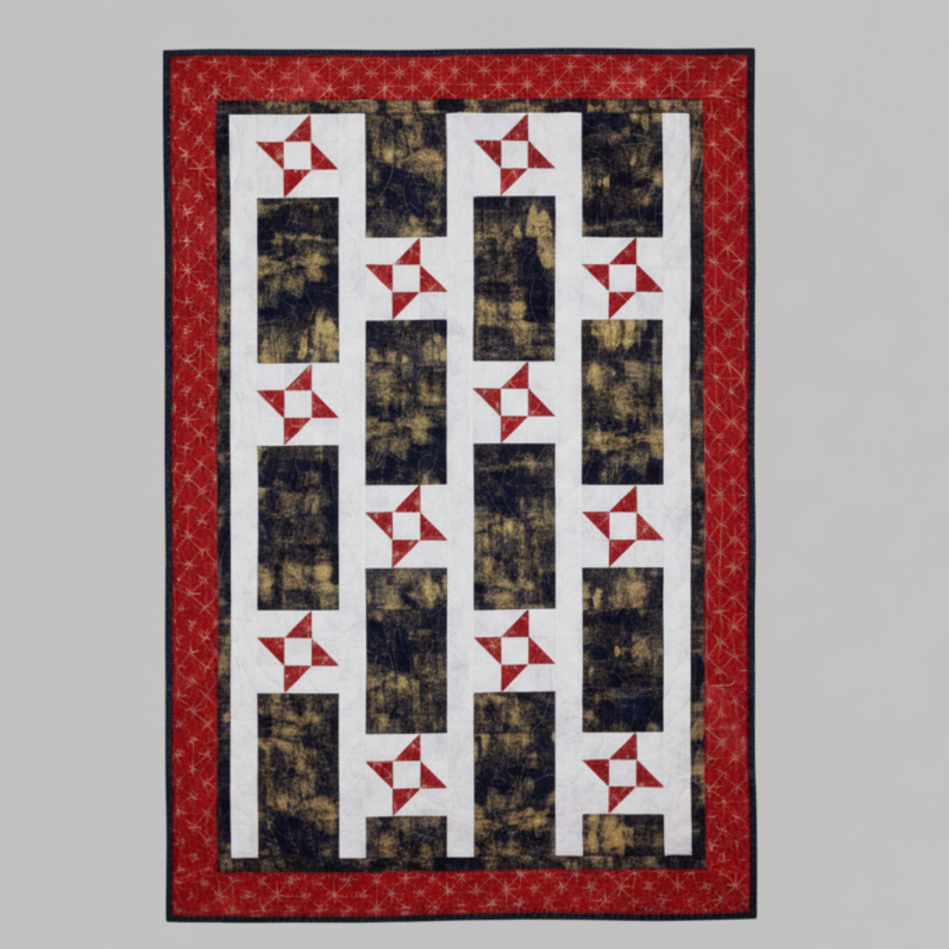 Patriotic lap quilt pattern with red white and blue star blocks from Make It Patriotic with 3-Yard Quilts