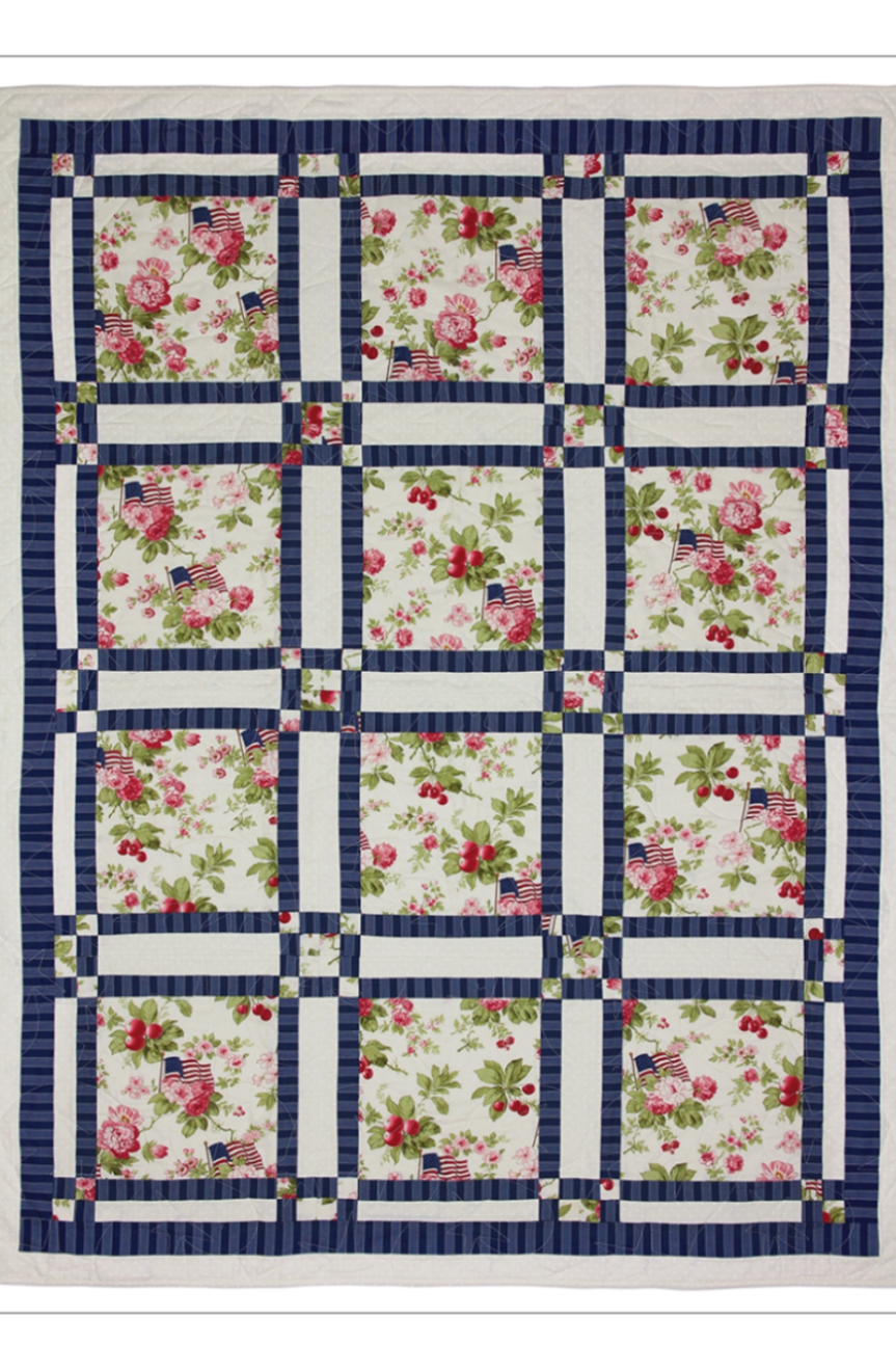 Patriotic floral quilt pattern with red white and blue accents from Make It Patriotic with 3-Yard Quilts