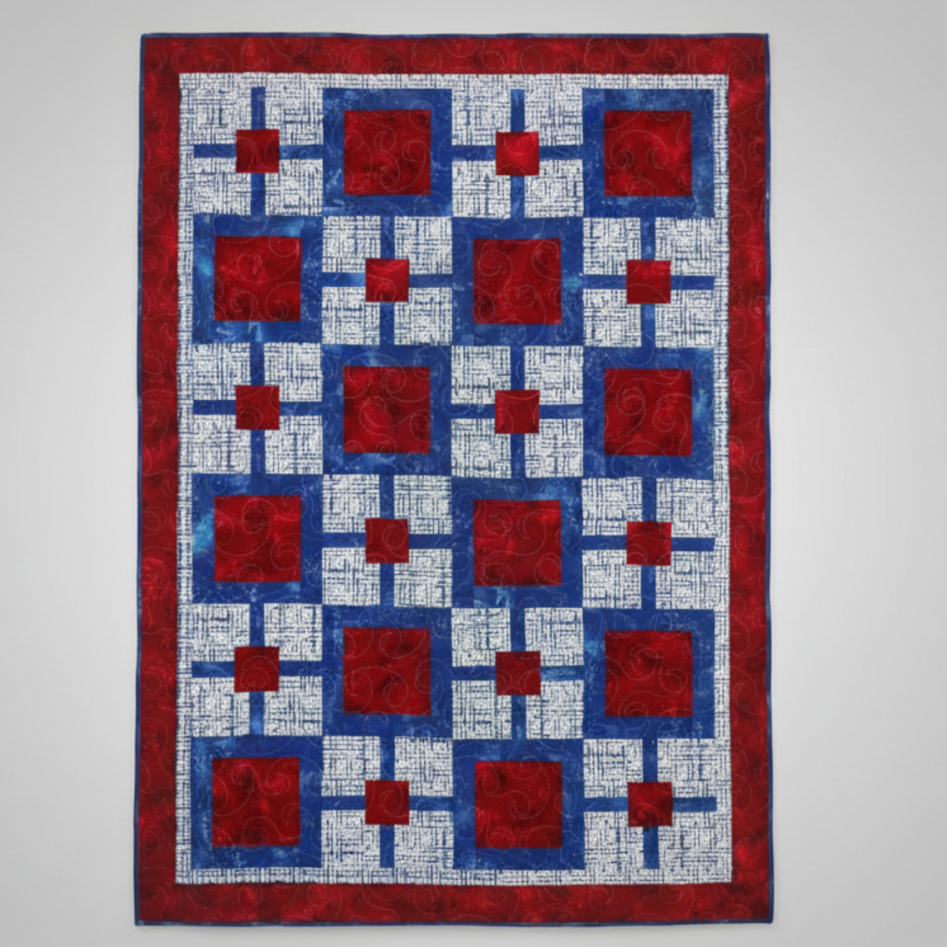 Red white and blue quilt pattern with framed blocks from Make It Patriotic with 3-Yard Quilts book