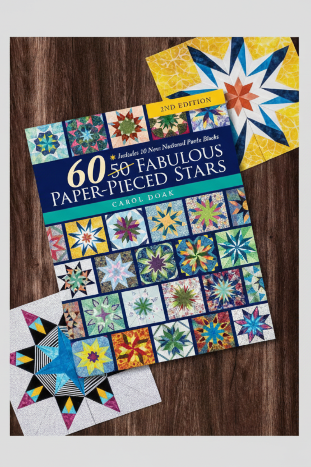“60 Fabulous Paper-Pieced Stars Second Edition quilt book cover featuring colorful star blocks by Carol Doak”