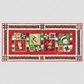 Holiday panel quilt with snowmen and pieced blocks in festive red and green